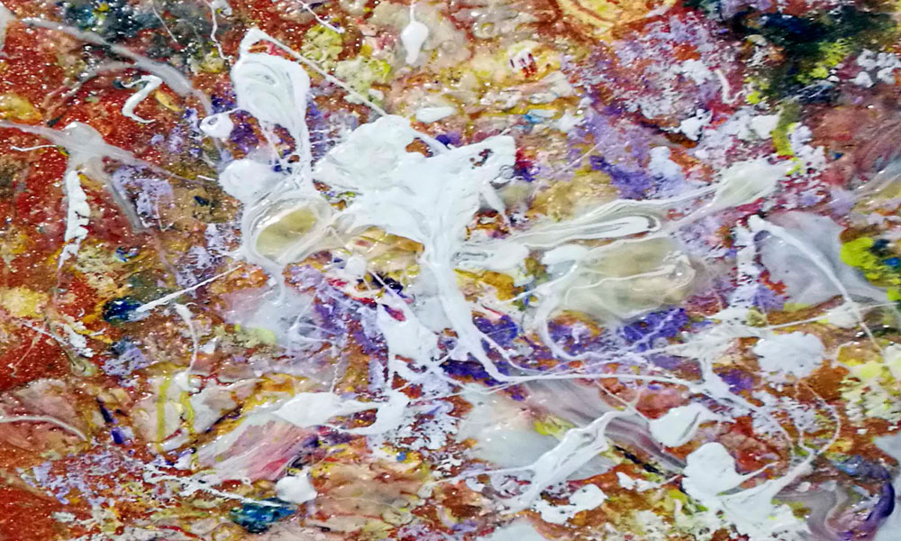 espuma_marina_azotando_corales_rojizos_luces